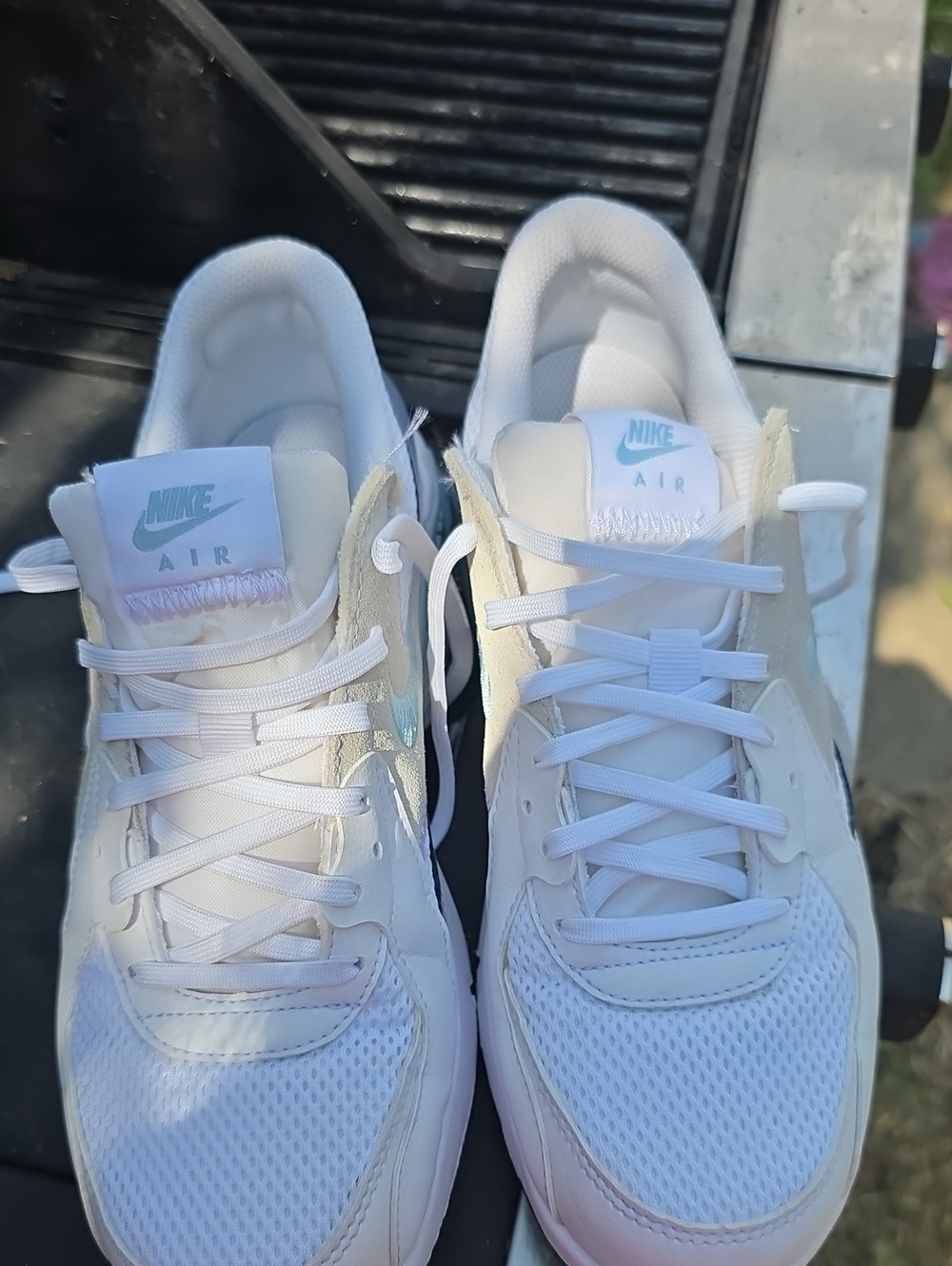 Nike Women's White Sneakers with Light Blue Logo